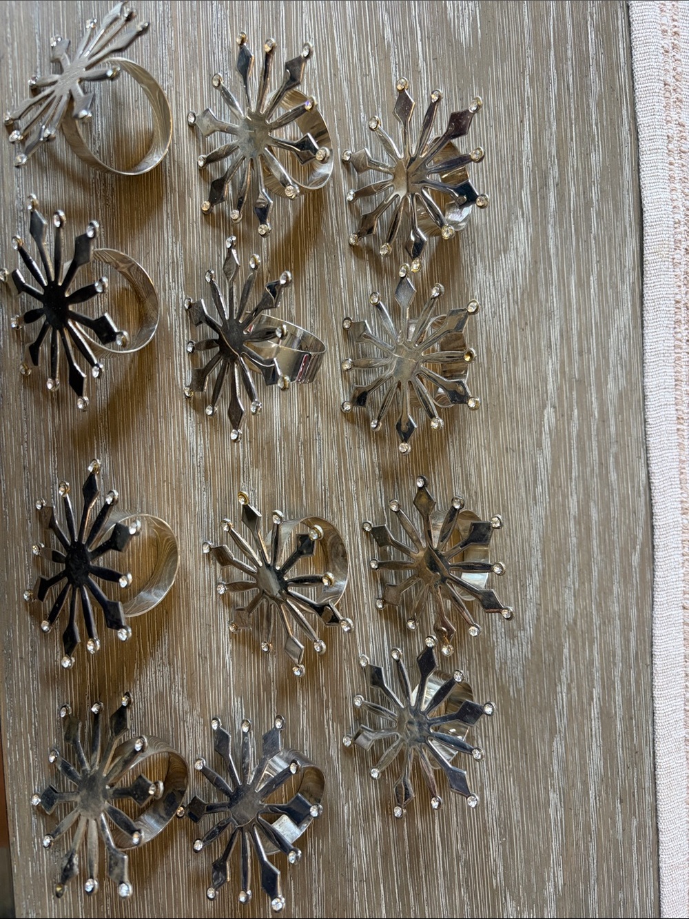Set of 12 Silver Starburst Napkin Rings